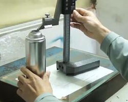 inspección de latas de aerosol